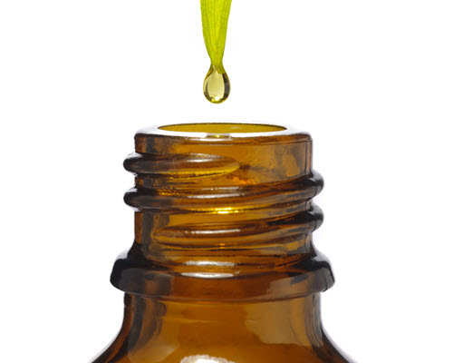 tea-tree-oil-drip-from-leaf-into-bottle